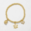 Goldenes Perlenarmband mit Herz, Schildkröte und Muschel Anhängern aus Zirkonia und Opalen - Weißer Schildkrötenanhänger / Weiß