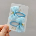 Pair of light blue polka dot tulle bow hair clips with pearl charm on display card - BB Snap Clips (Pair) / Blue