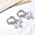 Elegant heart-shaped silver earrings with cascading white pearls on a vintage background - Silver 3-Pearl Style