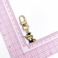 Cartoon witch keychain with black enamel finish and gold metal ring, showing 6cm length size - Witch (KC Gold Clasp)