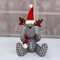 Renna di Natale in peluche a quadri neri e bianchi con cappello a maglia rosso - Griglia Grande Nero-Bianco