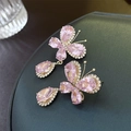 Elegante goldene Schmetterling Ohrringe mit rosa Tropfenkristallen und Zirkonia Steinen - Rosa Schmetterlings-Tropfenohrringe (Silbernadel)