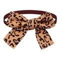 Close-up of leopard print pet bowtie with brown elastic band on a white background - Brown Leopard