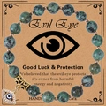 Pink zebra stone bracelet with blue evil eye charm on a vintage protection card - African Pine Stone Bracelet