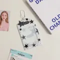 Detail of white star pattern acrylic photocard holder with metal bead chain and star art - Black