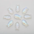 Macro detail of nine iridescent acrylic fish beads with scale texture for DIY jewelry - Imported Colorful