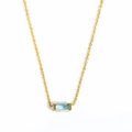 Gold-plated birthstone necklace with a rectangular light blue gem and fine chain link - December Necklace - Blue Topaz