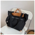 Schwarze Canvas-Tragetasche mit braunen Ledergriffen und GHT FASH ON Aufdruck - Schwarz
