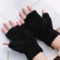 Pair of thick black plush half-finger gloves for winter warmth on a magazine background - One Size / Black