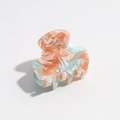 Detail of mint green and pink marble pattern hair claw clip with glossy finish - Blue Orange Gradient