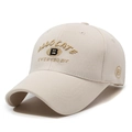 Beige baseball cap with golden embroidery details in a 45-degree angle product view - Light Beige