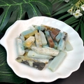 Macro detail of natural amazonite long bar beads for DIY jewelry in a shell dish - Amazonite