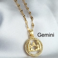 Gold-plated Gemini zodiac pendant necklace with sparkling cubic zirconia on white silk - Gemini
