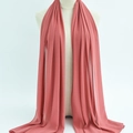 Elegant dusty pink chiffon hijab scarf for women displayed on a mannequin - 45
