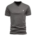 Detail of dark grey cotton polo shirt showing metal zipper neck and lion head embroidery - S / Dark Gray