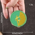 Green round rock climbing patch with yellow silhouette embroidery and 5cm size scale - Green Climbing