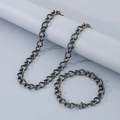 Detailed view of dark gray stainless steel twisted chain necklace and bracelet set - Bracelet 20CM / Matte Black