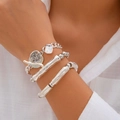 Three-piece silver metal bracelet set with heart pendants and hammered texture details - Silver Coin Charm Triple Set Style (4674) / Silver