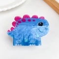 Cute blue cartoon dinosaur hair claw clip with pink spiral patterns for kids - Stegosaurus