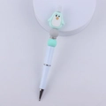 Detail of beaded ballpoint pen featuring a mint green cartoon penguin and rhinestone charms - Green Penguin