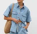 Detail of light blue denim shirt set showing collar, buttons and front pocket texture - S / Light Blue Top