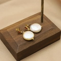 Baroque pearl earrings in gold with red gemstone accents on premium wood stand - Rose Red Zircon Stud Earrings 13mm