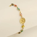 Gold plated evil eye bracelet featuring multi-color charms and letter R pendant - Letter R