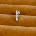 Macro shot of silver stainless steel earring featuring six aligned zircons and ball back - Silver (Bar Row Stone Style Y20412-15)