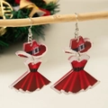 Dettaglio di orecchini Babbo Natale con cappello rosso e paillettes su ramo di legno - Stampa Acrilica / Stile Abito Natalizio Rosso