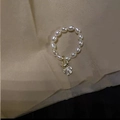 Baroque freshwater pearl beaded ring featuring a gold bear charm with pavé crystals - Bear Charm Freshwater Pearl Ring