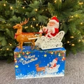 Elektrischer Weihnachtsmann mit Rentier und weißem Schlitten in Geschenkbox - Rentier und Schlitten