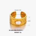 Golden stainless steel wide ring featuring hammered texture and oval pearl inlay - Gold