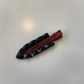 Detail of red and black seamless metal hair clip with glossy retro wave pattern - Black / Red Clip