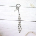 Silver mesh chain keychain with heart charm and bow tassel on white wood - Silver Round Keychain [Small Heart Style]