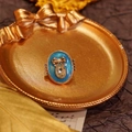 Vintage floral brooch with blue enamel crystal and gold bow tie on dark background - Oval Bowknot-Sky Blue