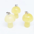 Three yellow mushroom charms made of natural stone resin with durable metal clasps - Yellow Jade