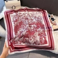 Macro detail of elegant red landscape print silk scarf on plush white background - 70*70cm / Red Toile de Jouy Print