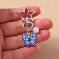 Blue enamel butterfly keychain with rhinestones and pearl charm on a silver star clasp - Large Butterfly