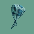 Handmade crochet mint green bandana with blue butterfly pattern and woven ties - Mint Green Butterfly