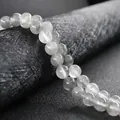 Polished natural white crystal round beads with translucent icy texture for jewelry making - Cloud Crystal / 2mm