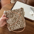 Detail of brown canvas crossbody bag with ethnic floral embroidery and leather strap - Khaki