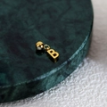 Polished gold initial B pendant with circular bead clasp on dark green marble base - Letter Pendant (B) / Gold