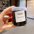 Elastic black hair ties set in a clear plastic container with basic accessory label - 6# All Black (50pcs Jar)