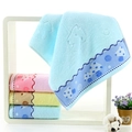 Sky blue absorbent cotton towel with wavy edges and mushroom print on a white rack - Cotton Mushroom Blue (Towel)