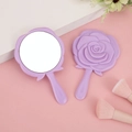Portable purple handheld makeup mirror with rose floral relief design and round glass surface - Solid Purple