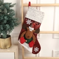 Detail of red faux leather Christmas stocking with 3D reindeer and plush trim accents - Brown Reindeer Faux Leather Hand Stocking