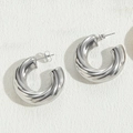 Polished silver-tone croissant hoop earrings with classic twisted design and butterfly clasp - 10*30 Twisted Large C Hollow Earrings Steel Color
