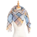 Plaid tassel shawl scarf in light blue, pink and yellow check on a wooden mannequin - Yellow