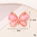 Detailed view of pink butterfly charm showing precise measurements 3cm by 2.2cm and 4g weight - D463 Small Butterfly (Pink)