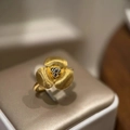 Golden brushed flower ring with silver bead center and delicate three-petal design - Brushed Flower